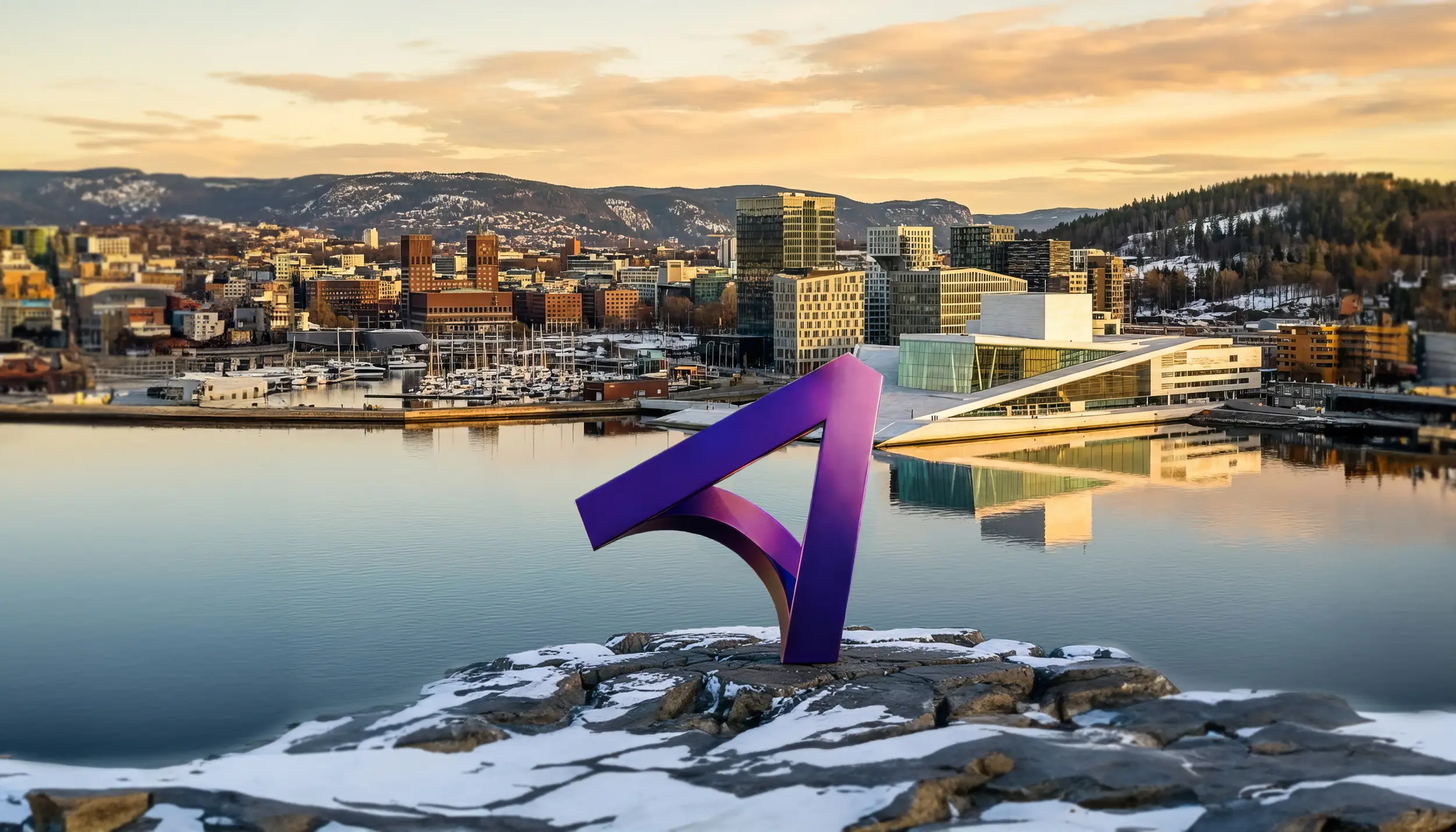 A modern city skyline at sunset reflected in calm harbor water, with snowy hills in the background. In the foreground, a large purple abstract sculpture shaped like a curved, angular “7” stands on a snow-dusted rocky outcrop. To the right, a striking white, sloped-roof building sits along the waterfront, and boats are docked in a marina nearby.